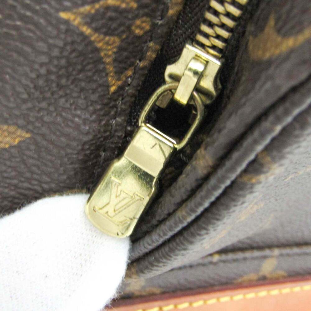 LOUIS VUITTON Brown Monogram Backpack - Picture 11 of 16